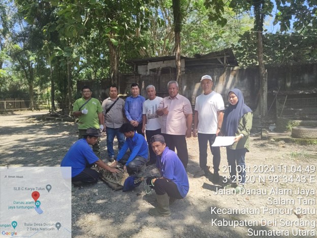 Warga Pancur Batu Serahkan Buaya Muara